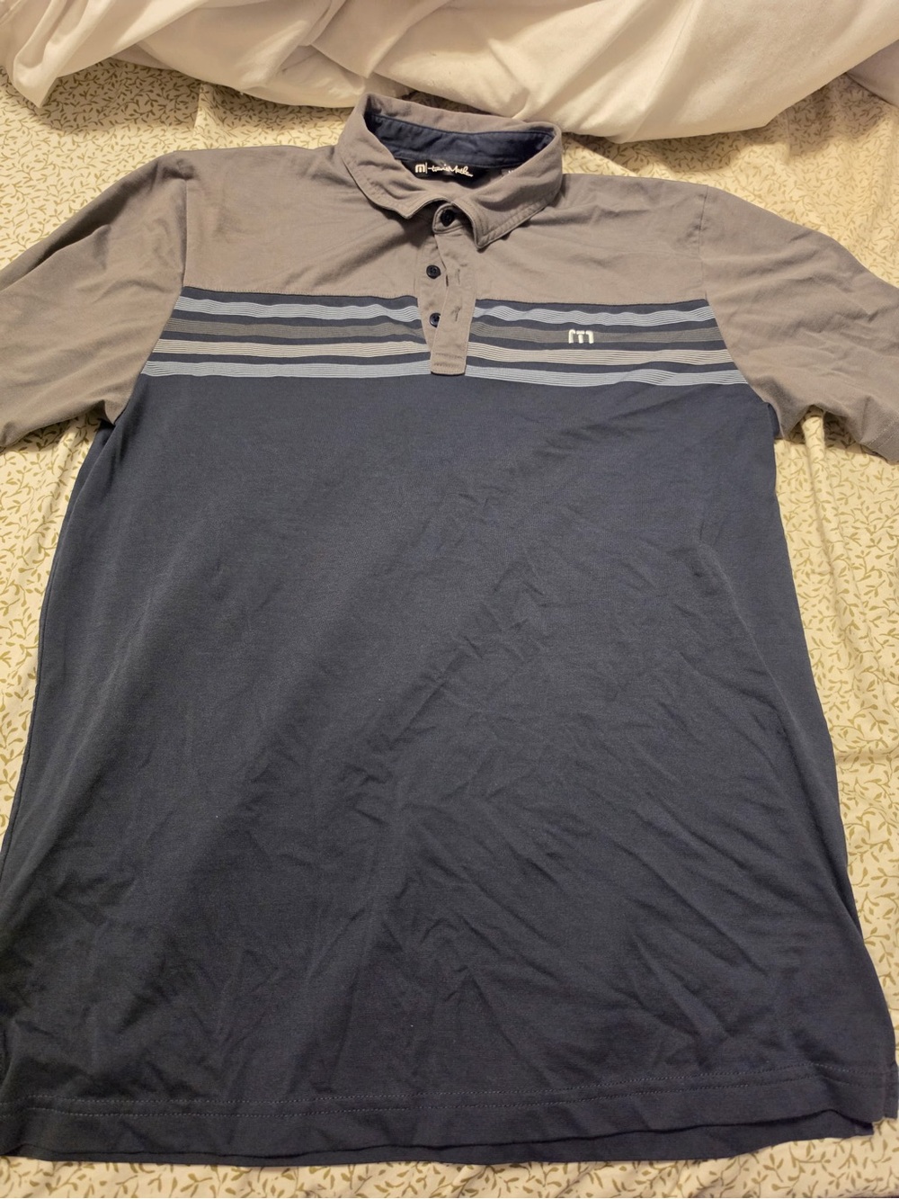 Travis Mathew navy blue polo